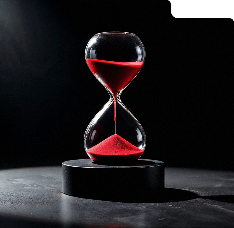 Close-up of a red sand hourglass symbolizing faster response time with AI automation